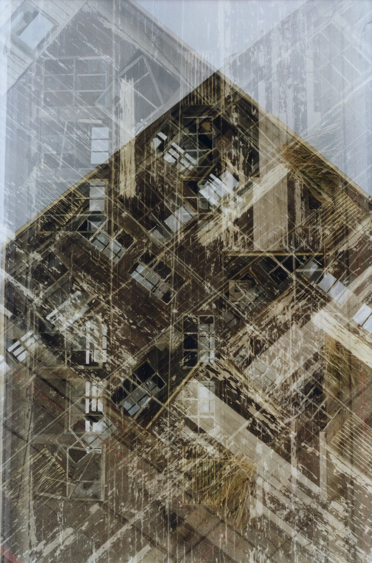 Layered multiple-exposure abstract photograph of scaffolding and building framework in sepia and grey diagonals.