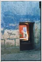 Doorway Through Blue and Red Walls